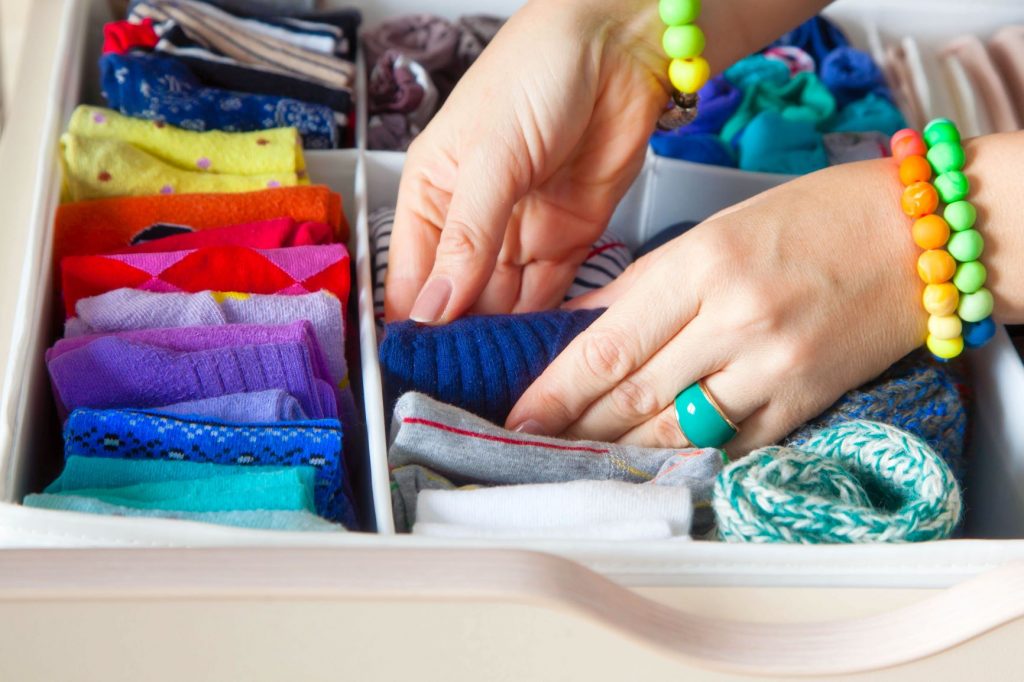 Clothes folded neatly in drawer