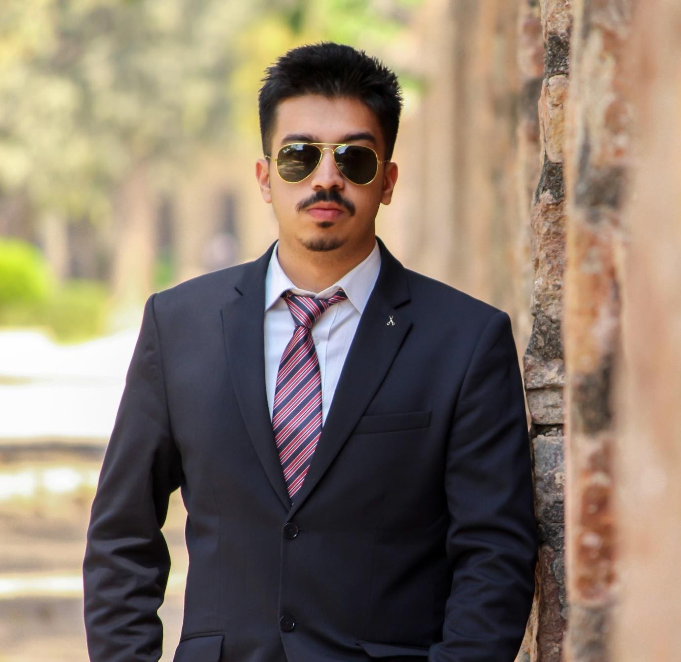 Man in suit standing outside